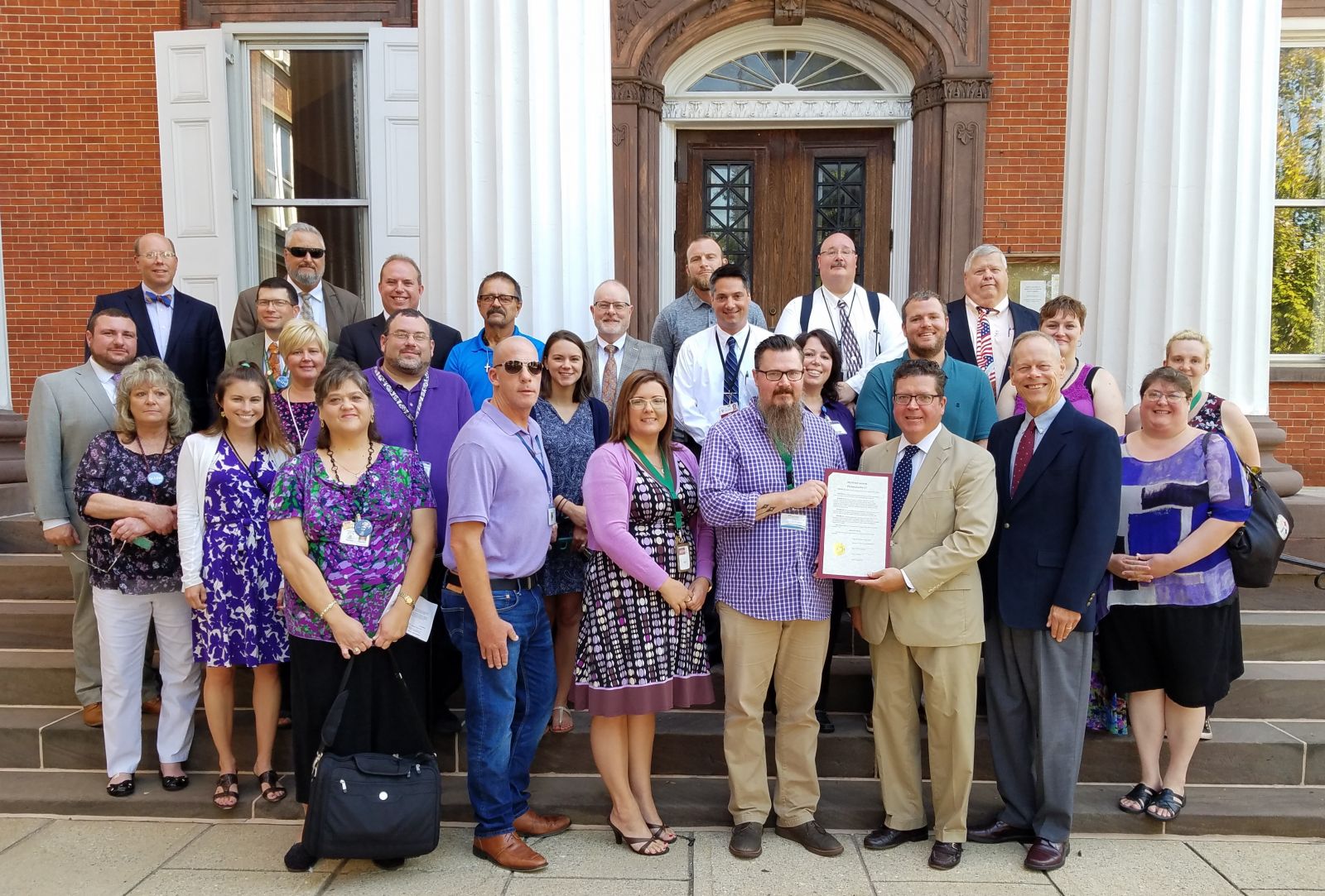On Tuesday morning, a proclamation was read in front of the courthouse naming September as Recovery Month in Franklin County. Representatives gather on the courthouse steps holding the proclamation document.