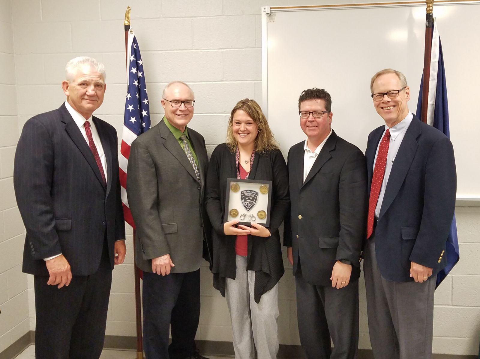 Pictured above, left to right: Former County Administrator John Hart, Commissioner Bob Thomas, Correctional Treatment Specialist and Correctional Worker of the Year Heather Franzoni, Commissioner Chairman Dave Keller, Commissioner Bob Ziobrowski