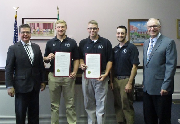 Pictured above (left to right): Commissioner Chairman Dave Keller, Wyatt Craig, Bryce Summers, 4-H Youth Educator Jason Goetz, and Commissioner Bob Thomas