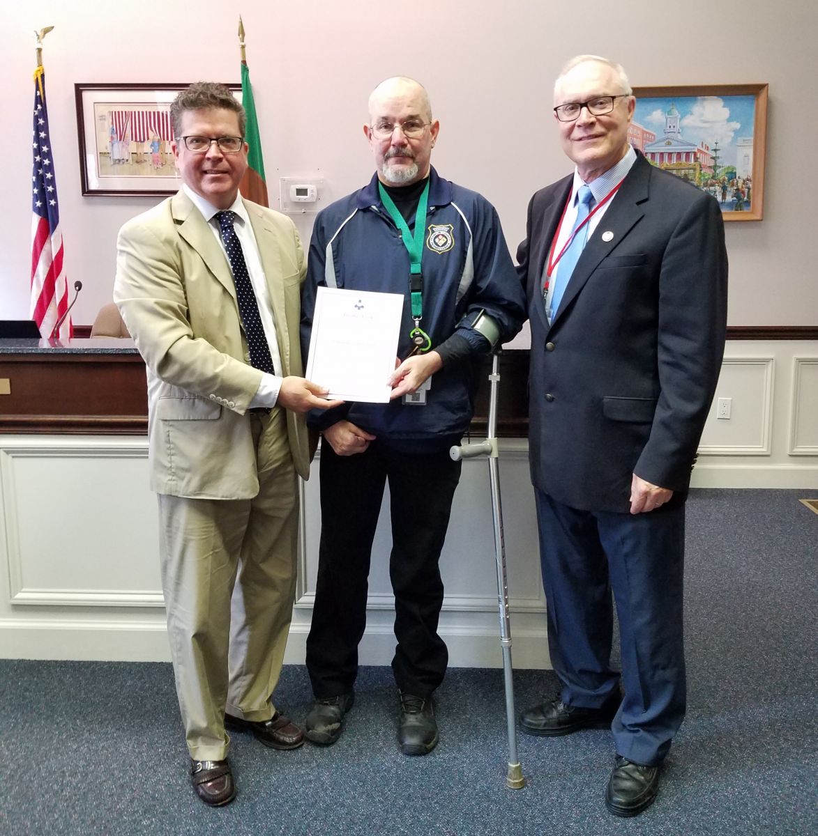 Pictured above: Commissioner Chairman Dave Keller, Department of Emergency Services Telecommunicator Tom Cook, Commissioner Bob Thomas
