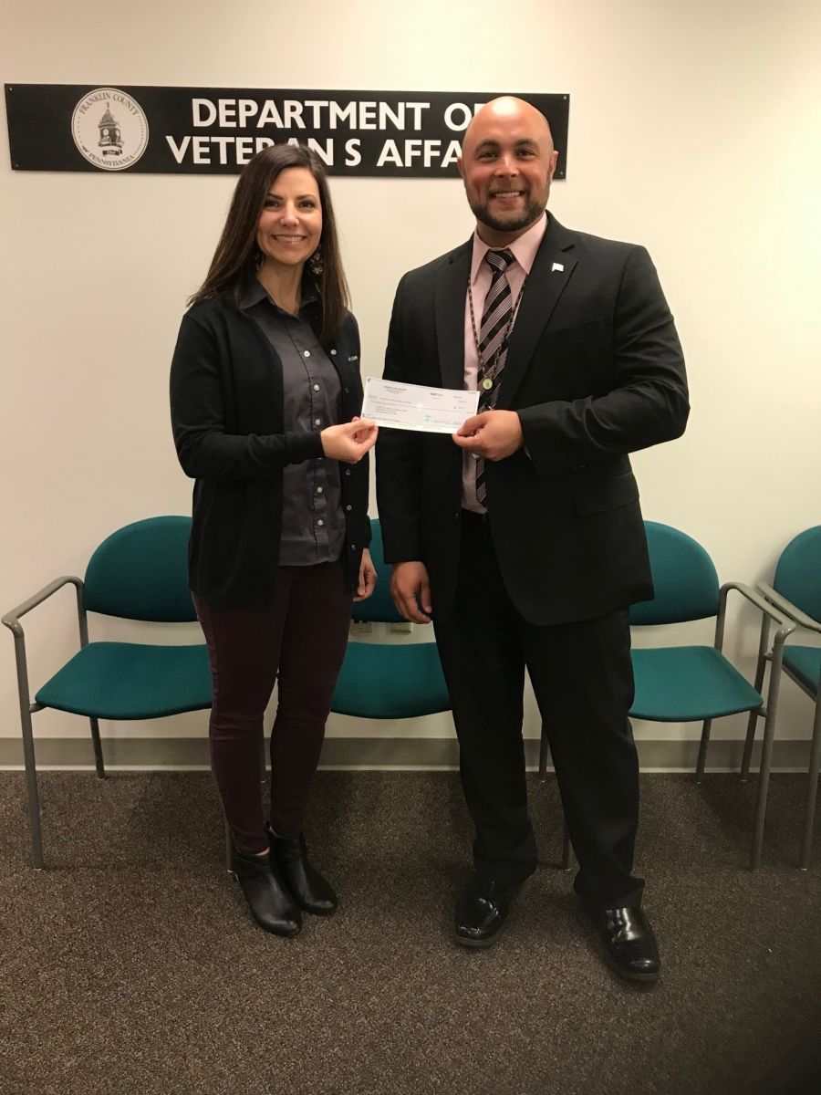 Pictured (left to right): Natalie Price of Ludwick Eye Center and Department of Veterans Affairs Director Justin Slep.