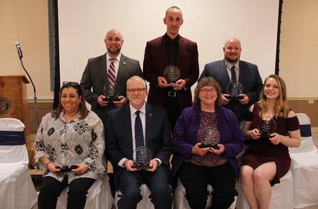 2018 SERVICE Value Award Winners, pictured above: (top row) Justin Slep, Director of Veterans Affairs and 2018 Value Award Winner for VISIBILITY; Charles W. Martin III, Human Resources Generalist  and 2018 Value Award Winner for EMPLOYEES; Jason Miller, Assistant Communication Coordinator, Department of Emergency Services and 2018 Value Award Winner for CONTINUOUS IMPROVEMENT; (bottom row) Melyssa Flud, Director of Special Services, Jail Administration and 2018 Value Award Winner for STEWARDSHIP; David Smith, Captain, Jail Administration and 2018 Value Award Winner for INTEGRITY; Joanne Sheets, Administrative Assistant I, Department of Emergency Services and 2018 Value Award Winner for RESPONSIVENESS; Sarah Hamel, Healthy Living Coordinator, Human Resources and 2018 Value Award Winner for ENGAGEMENT