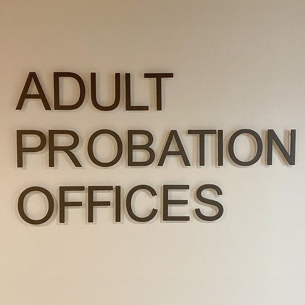 The sign on the building for Adult Probation Offices