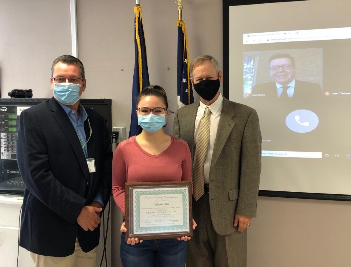 Photo (left to right): Commissioner John Flannery, awardee Andrea Fox, Commissioner Bob Ziobrowski, and Commissioner Chairman Dave Keller (remote)   