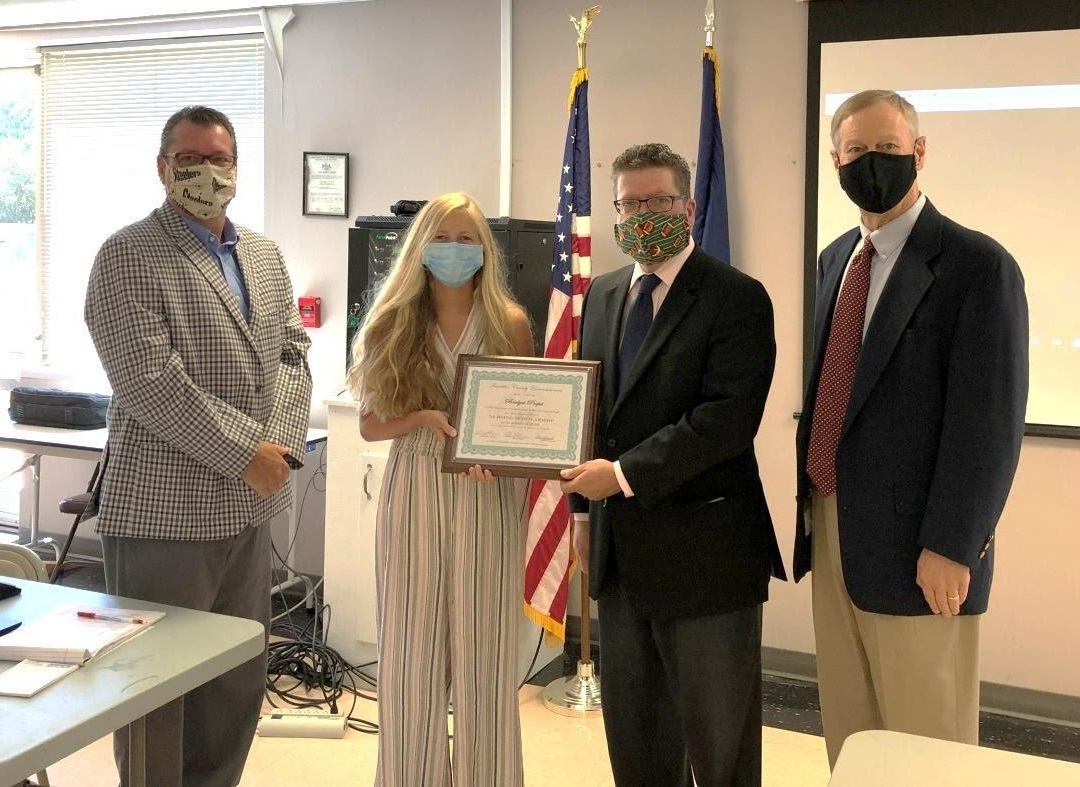 Photo (left to right): Commissioner John Flannery, awardee Bridget Propst, Commissioner Chairman Dave Keller, Commissioner Bob Ziobrowski 