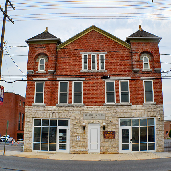 The exterior of the Divorce Hearing Annex on a blustery day.