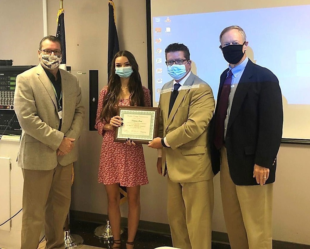 Photo (left to right): Commissioner John Flannery, awardee Kristina Jones, Commissioner Chairman Dave Keller, Commissioner Bob Ziobrowski              