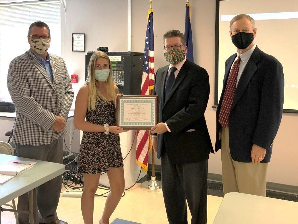 Photo (left to right): Commissioner John Flannery, awardee Madison Russell, Commissioner Chairman Dave Keller, Commissioner Bob Ziobrowski 