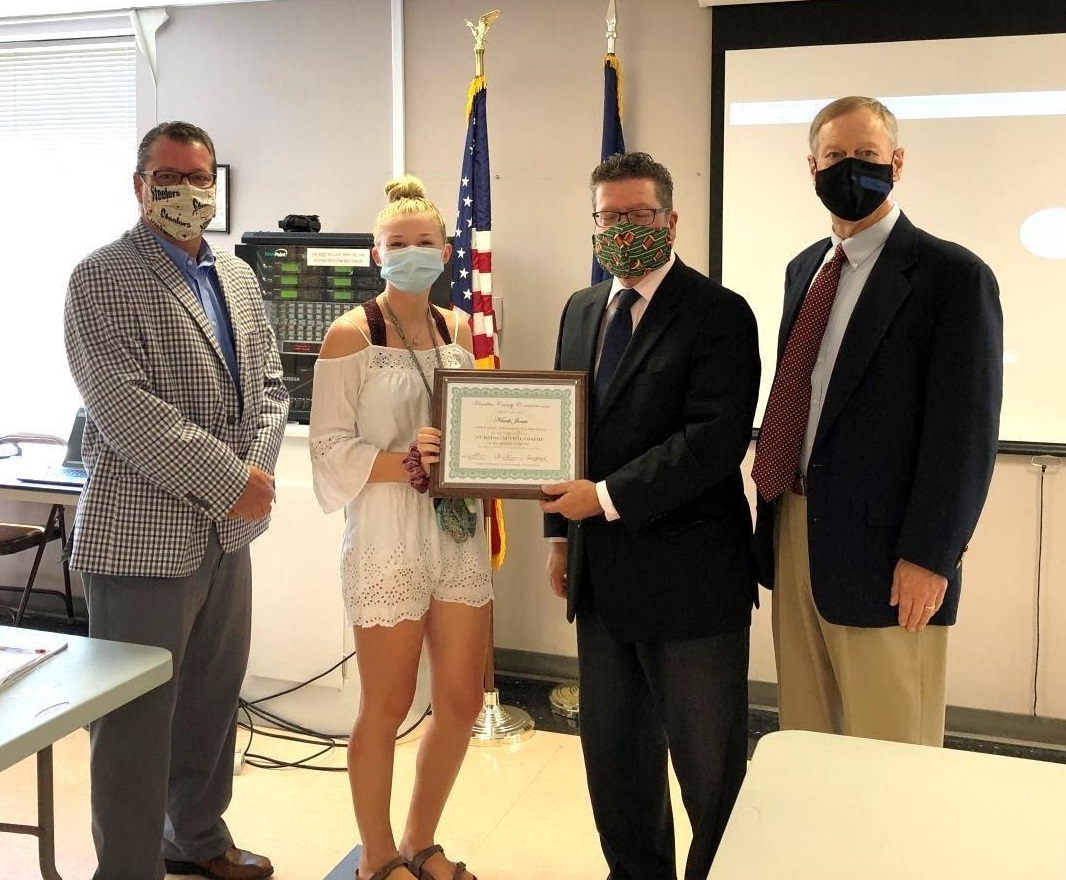 Photo (left to right): Commissioner John Flannery, awardee Nicole Jones, Commissioner Chairman Dave Keller, Commissioner Bob Ziobrowski    